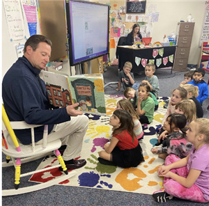 Mr. Ball reading a story